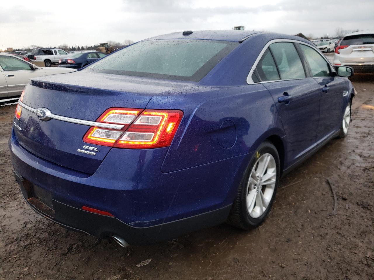 Photo 4 from auction – 2015 FORD TAURUS SEL with VIN 1FAHP2E82FG151162