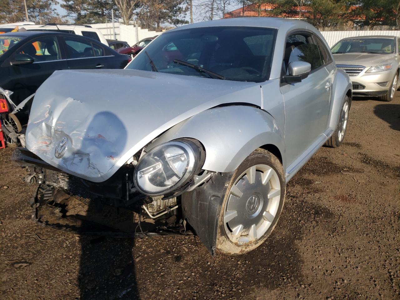 Photo 2 from auction – 2012 VOLKSWAGEN BEETLE with VIN 3VWJP7AT0CM658613
