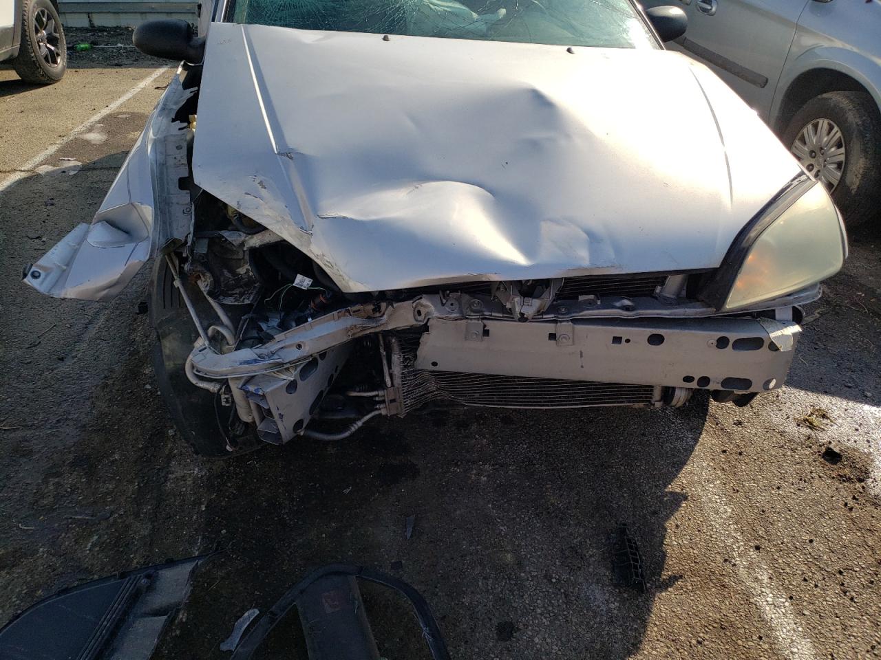 Photo 9 from auction – 2005 FORD FOCUS ZX4 with VIN 1FAFP34N85W102217
