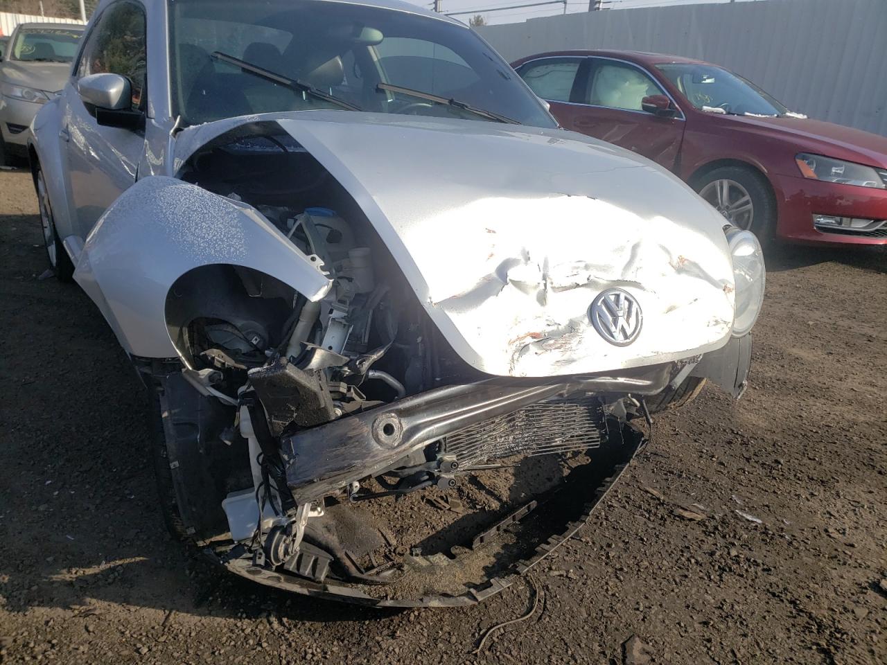 Photo 9 from auction – 2012 VOLKSWAGEN BEETLE with VIN 3VWJP7AT0CM658613