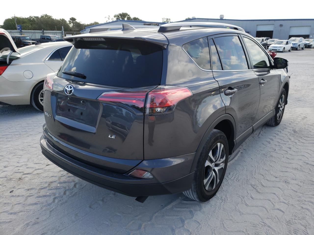 Photo 4 from auction – 2017 TOYOTA RAV4 LE with VIN JTMZFREV2HJ700249