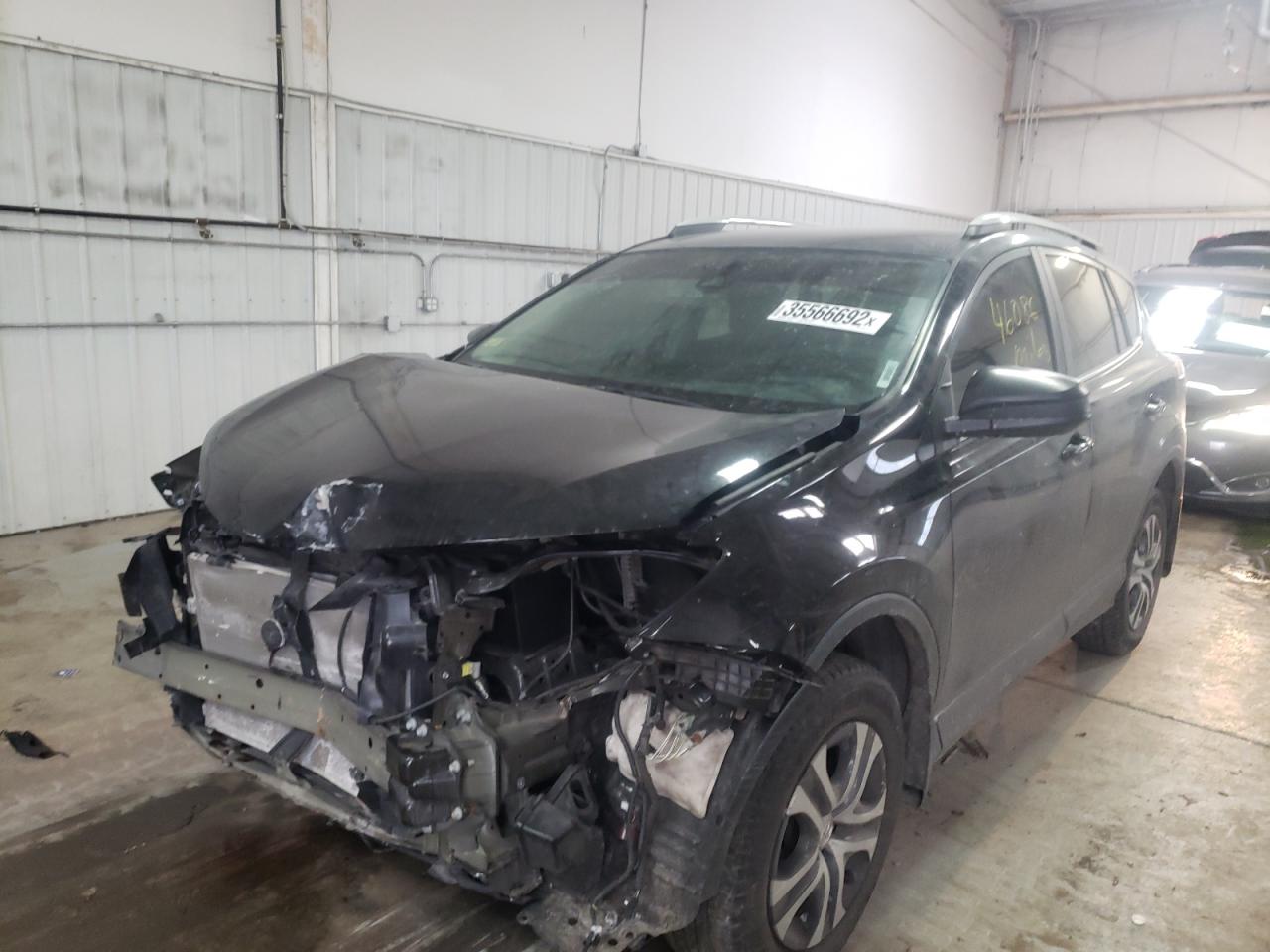 Photo 2 from auction – 2018 TOYOTA RAV4 LE with VIN 2T3ZFREV8JW513251