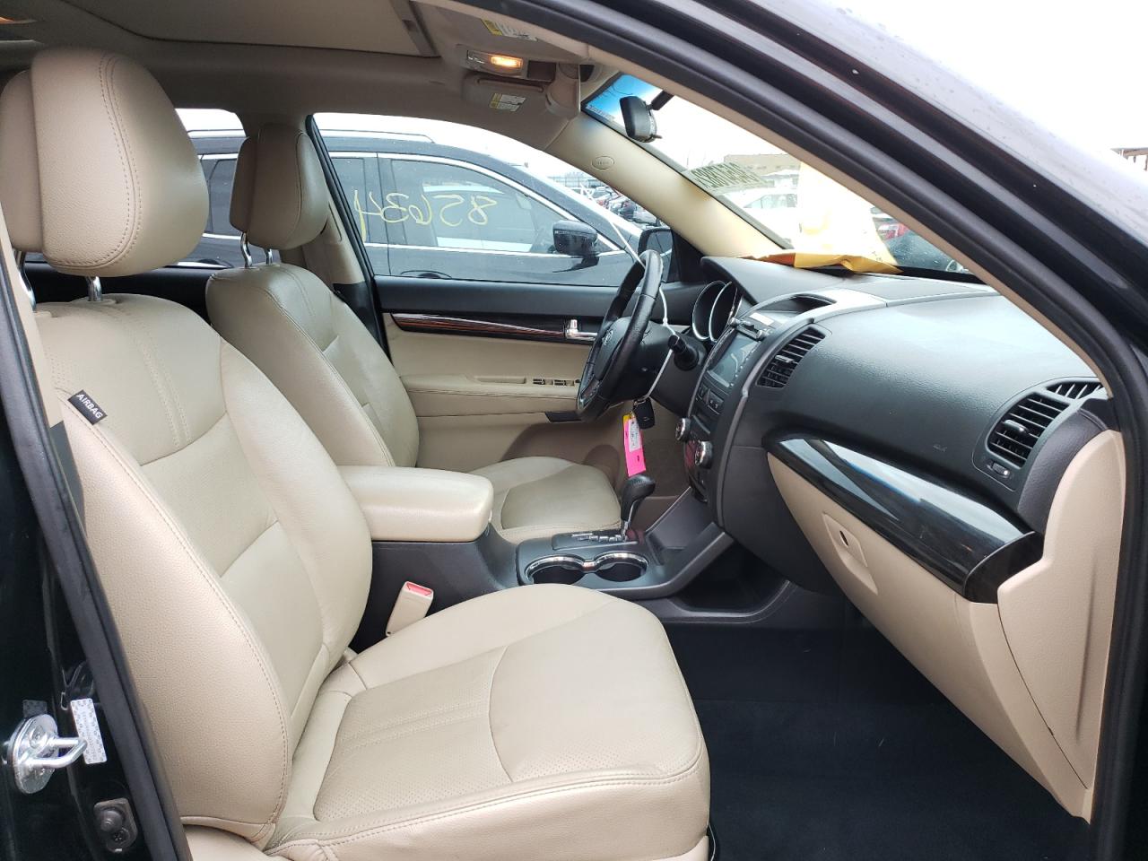 Photo 5 from auction – 2011 KIA SORENTO EX with VIN 5XYKU4A26BG077943