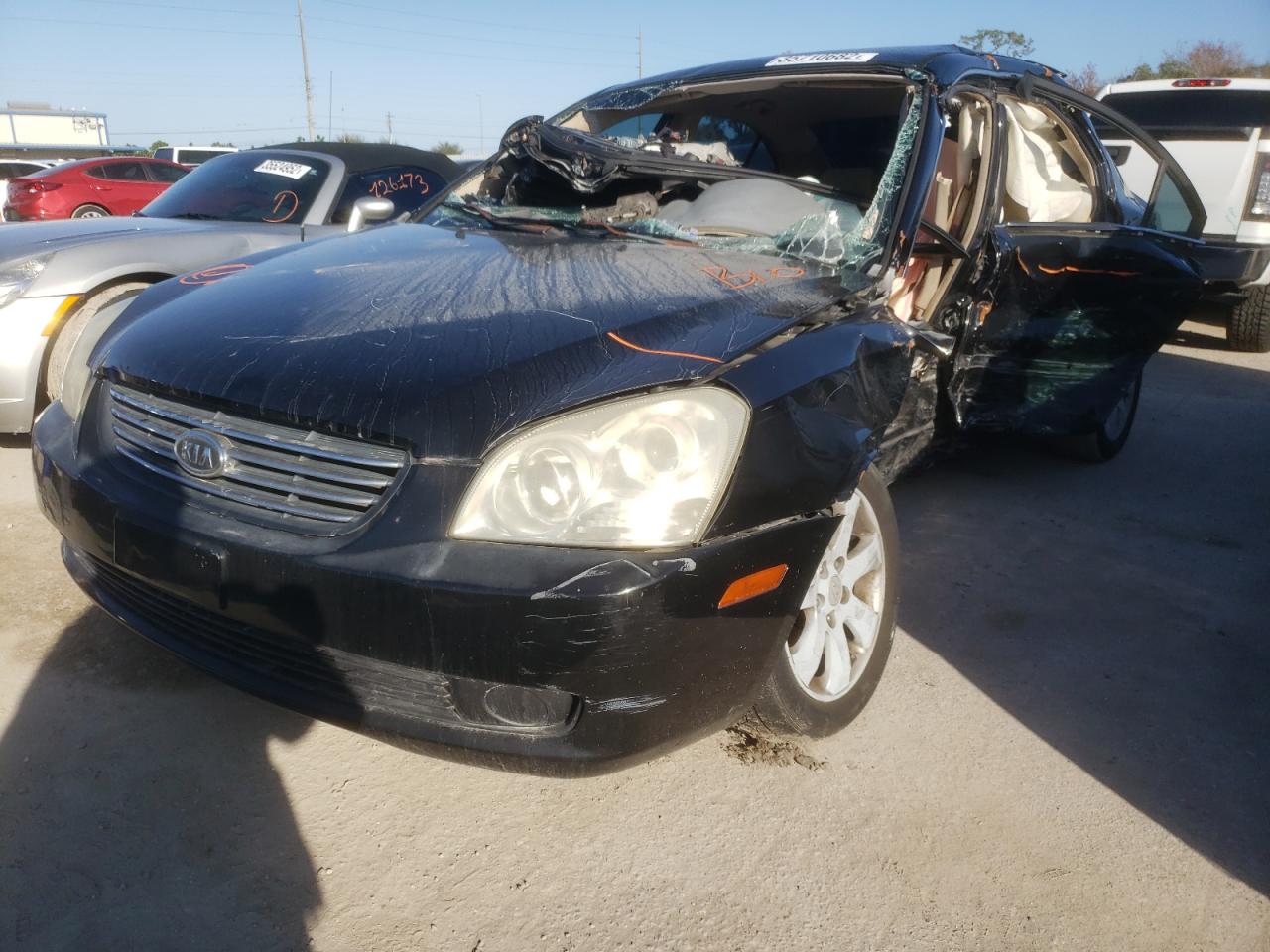 Photo 2 from auction – 2006 KIA OPTIMA LX with VIN KNAGE124965024246