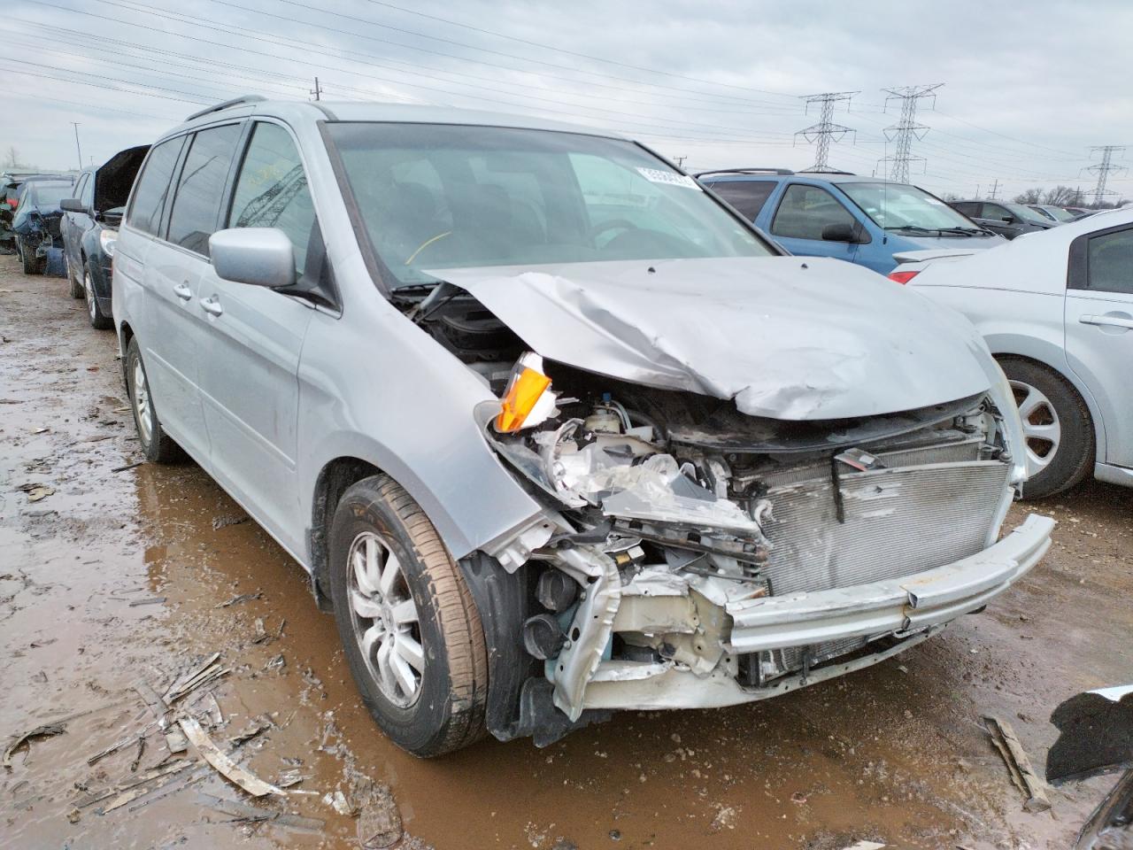 HONDA ODYSSEY EX 2010 with VIN 5FNRL3H44AB112231 - Photo from auction