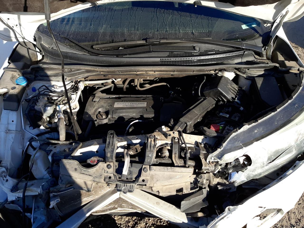 Photo 7 from auction – 2015 HONDA CR-V LX with VIN 5J6RM3H31FL027124