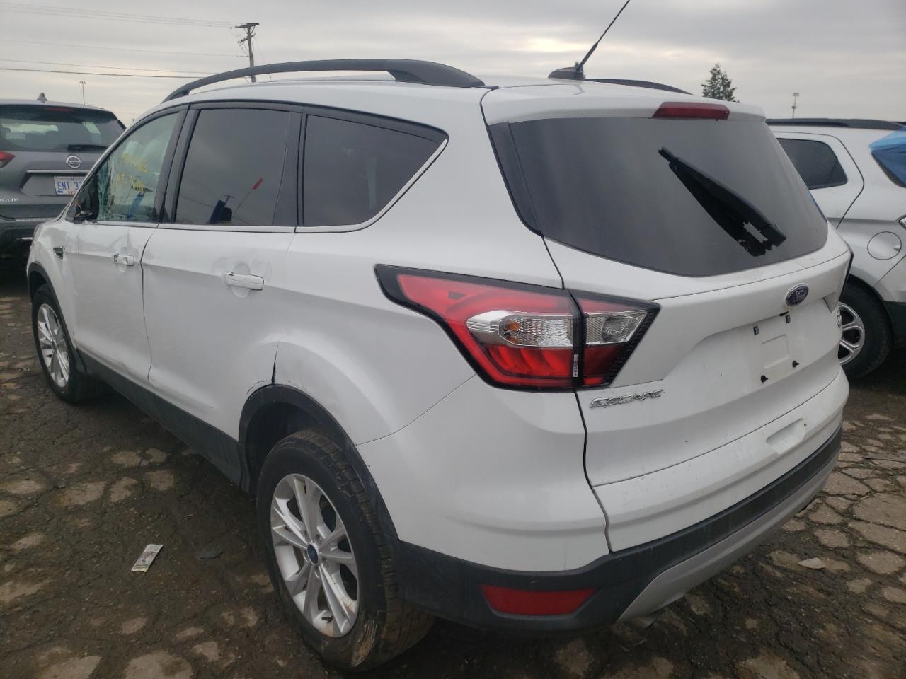 Photo 3 from auction – 2018 FORD ESCAPE SE with VIN 1FMCU9G98JUC63384