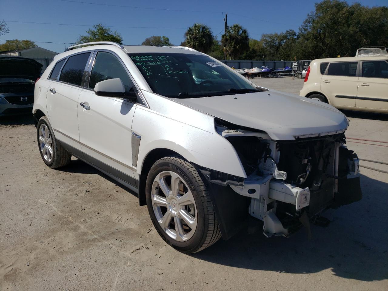 CADILLAC SRX PREMIU 2016 with VIN 3GYFNDE39GS576592 - Photo from auction