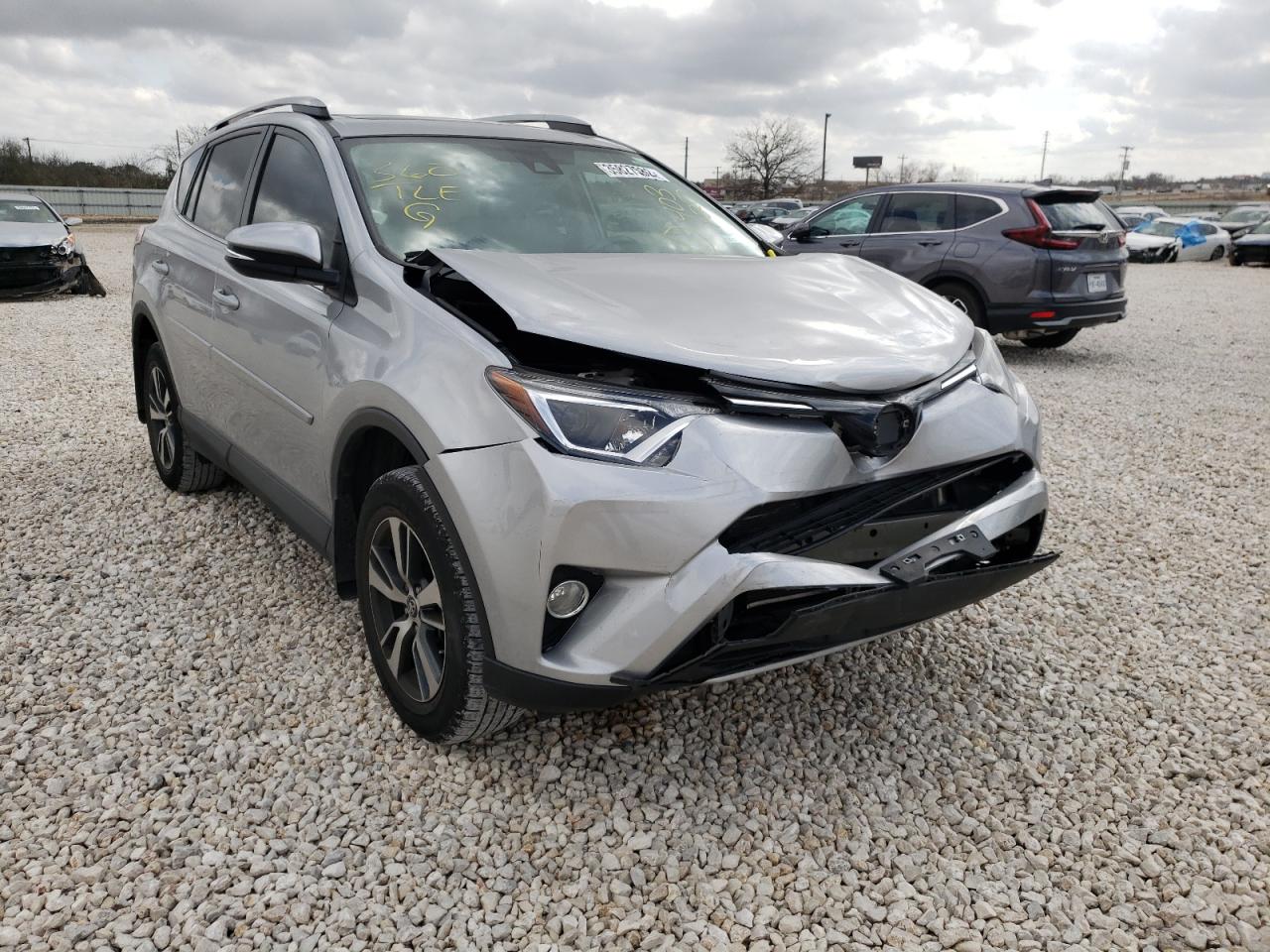 TOYOTA RAV4 XLE 2017 with VIN 2T3WFREV6HW403120 - Photo from auction