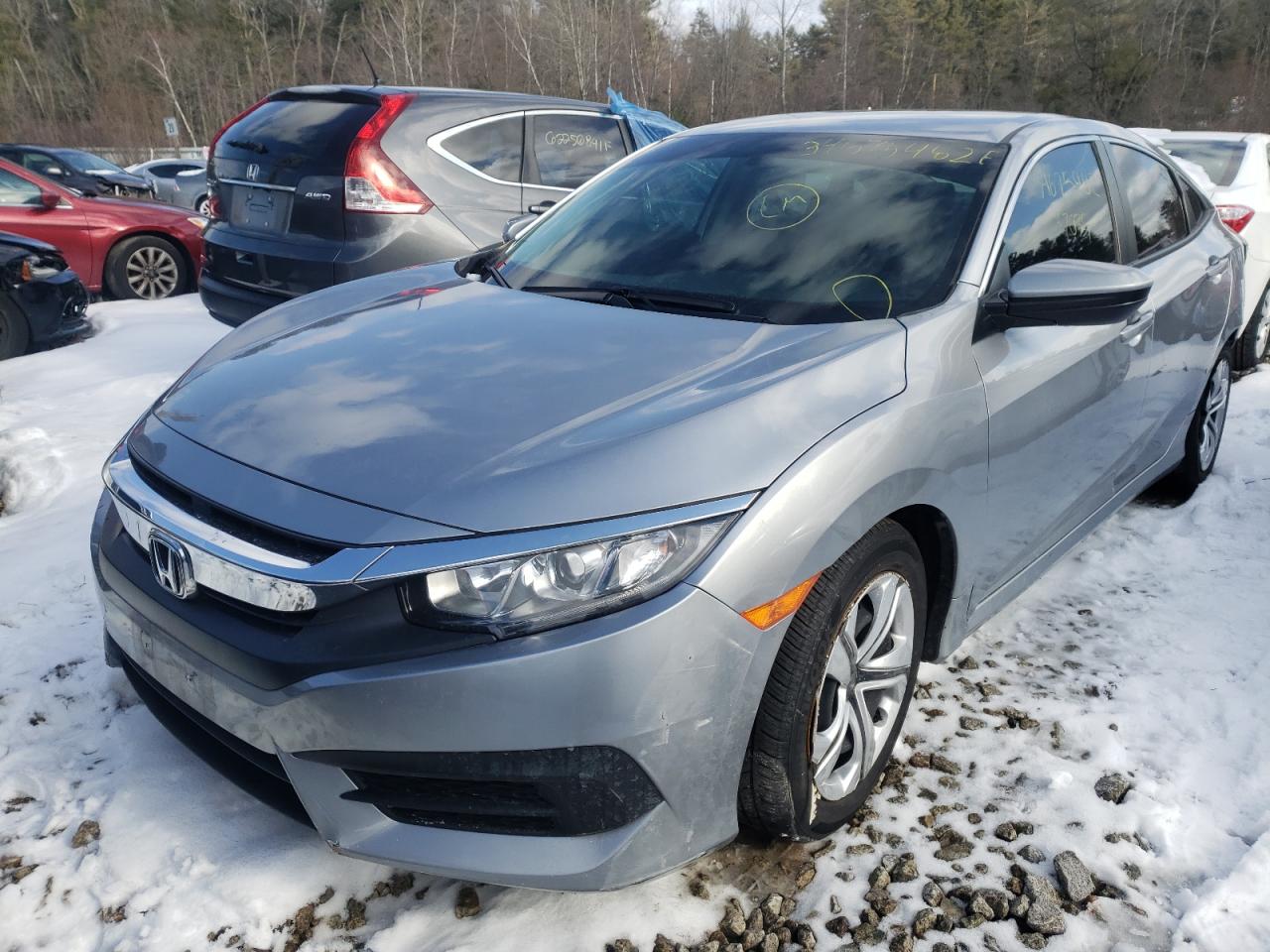 Photo 2 from auction – 2017 HONDA CIVIC LX with VIN 19XFC2F59HE227075