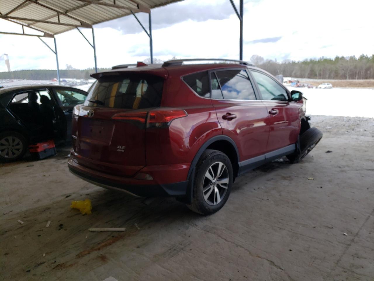 Photo 4 from auction – 2018 TOYOTA RAV4 with VIN 2T3RFREV1JW709158
