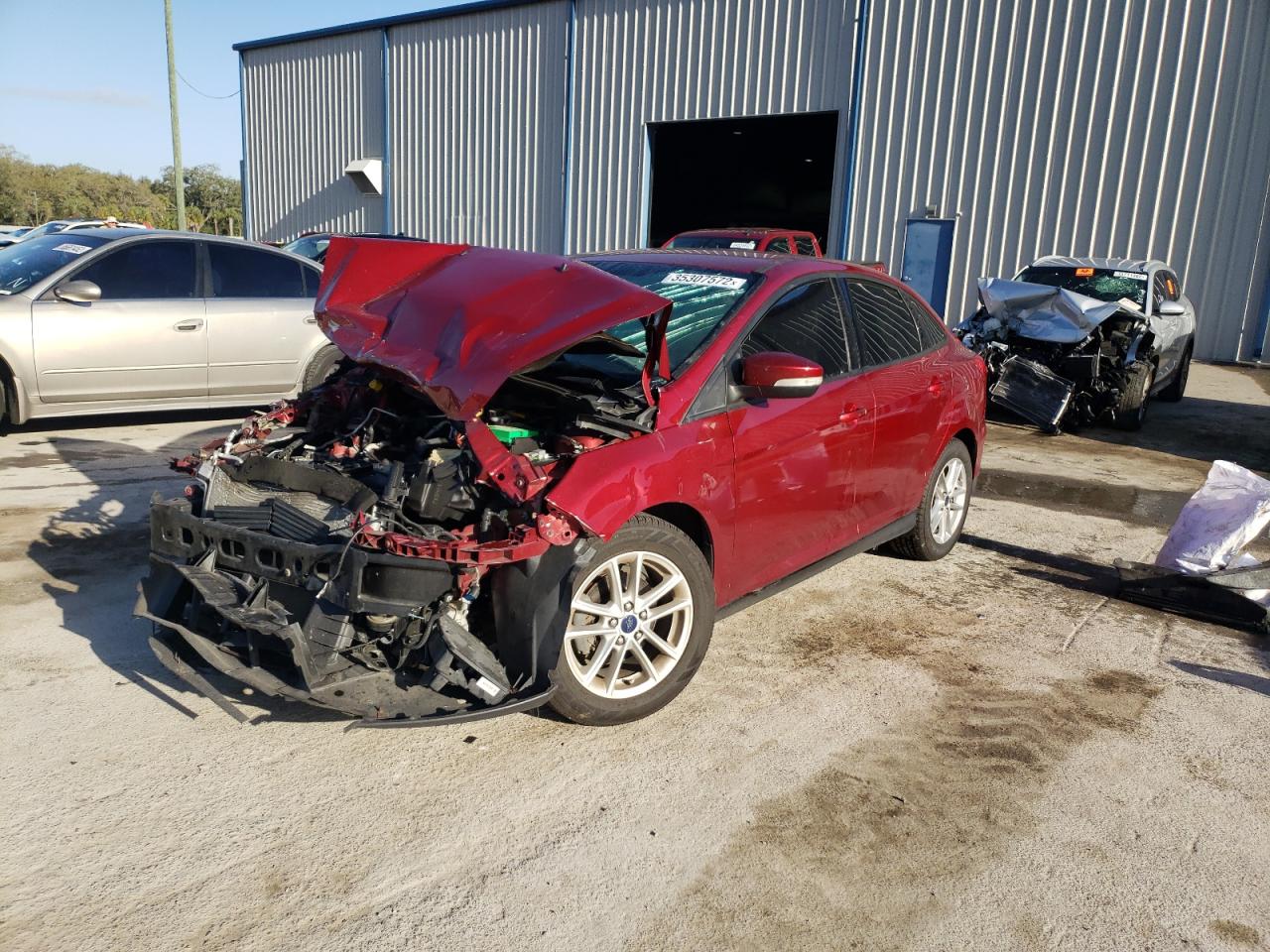 Photo 2 from auction – 2015 FORD FOCUS SE with VIN 1FADP3F29FL345757