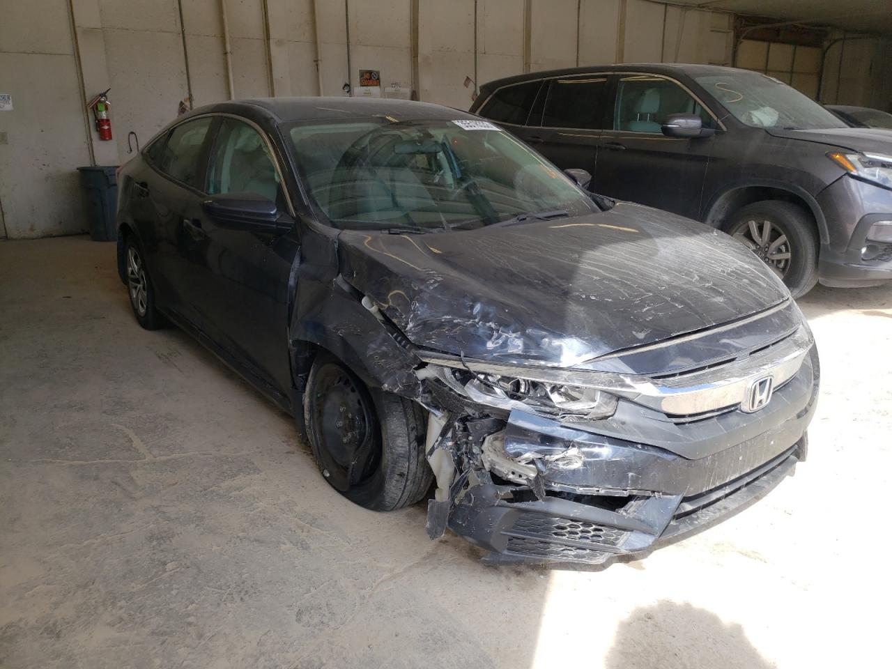 Photo 1 from auction – 2017 HONDA CIVIC LX with VIN 19XFC2F51HE056113