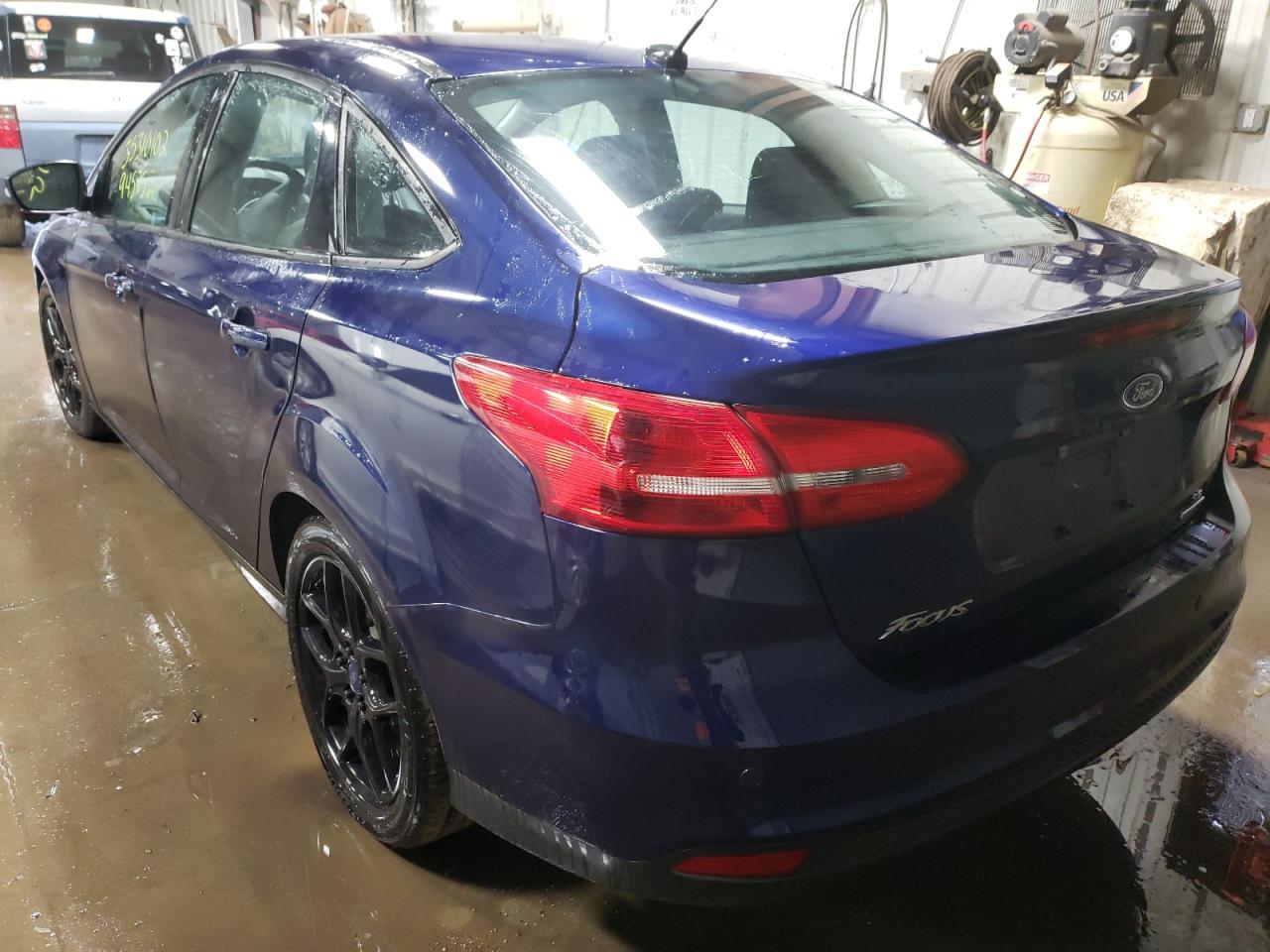 Photo 3 from auction – 2016 FORD FOCUS SE with VIN 1FADP3F24GL299093