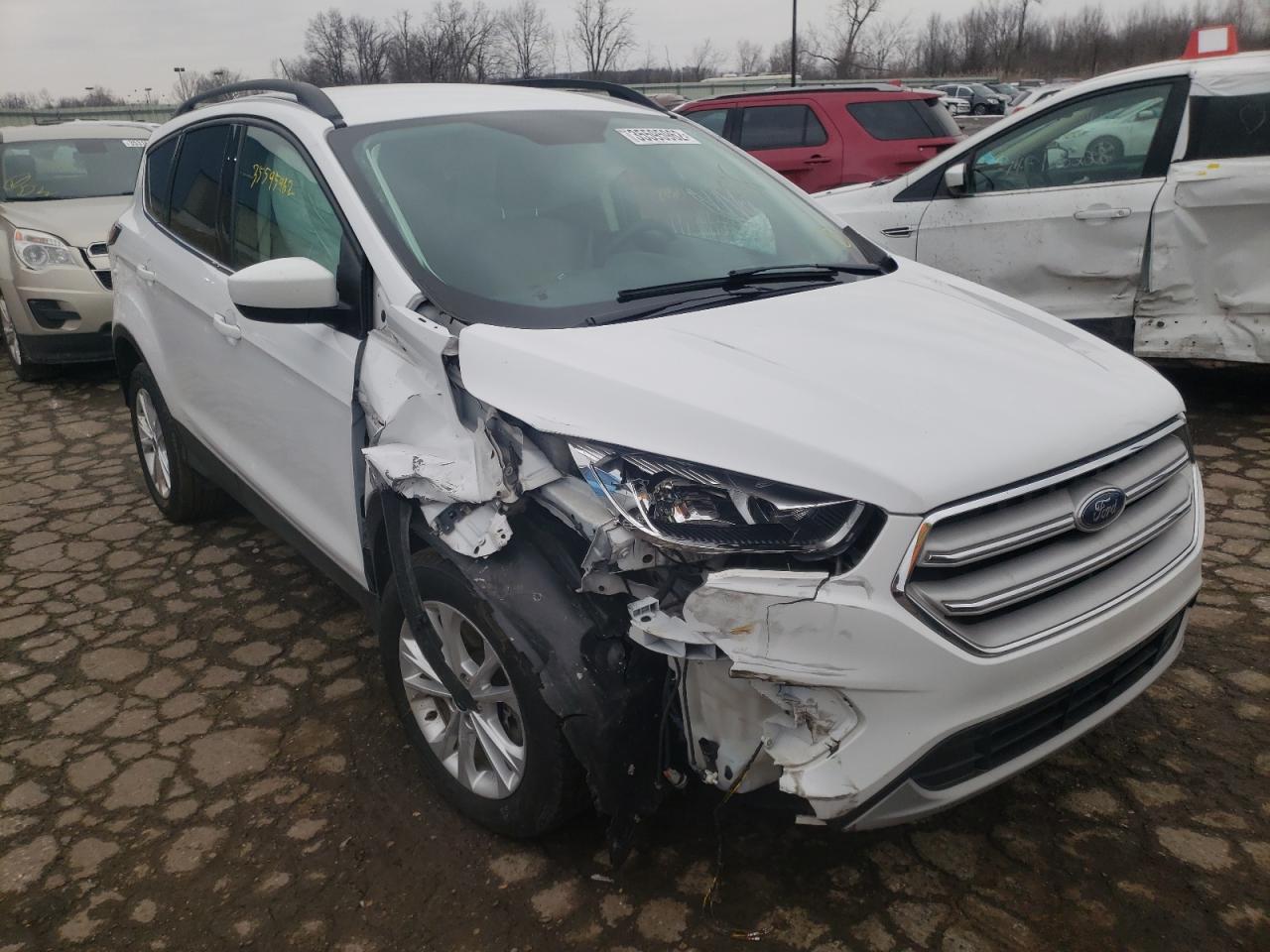 FORD ESCAPE SE 2018 with VIN 1FMCU9G98JUC63384 - Photo from auction