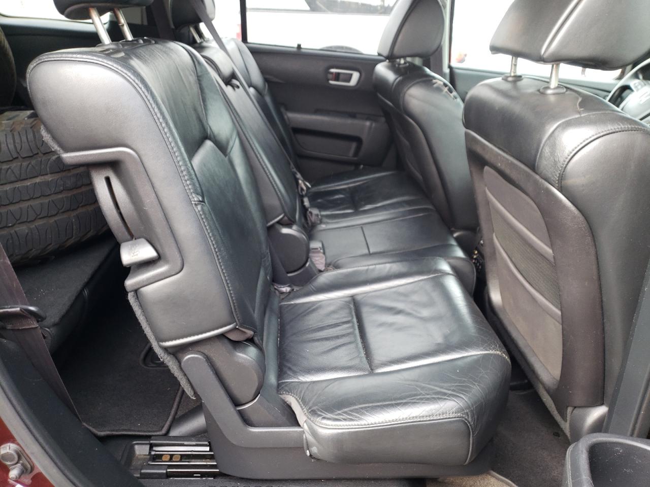 Фото 6 с аукциона – 2011 HONDA PILOT TOUR с VIN 5FNYF4H91BB022038