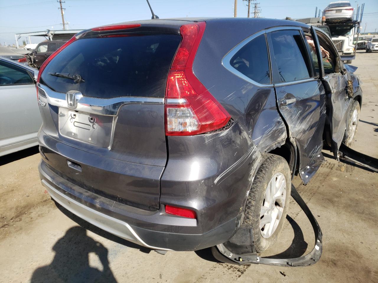 Photo 4 from auction – 2015 HONDA CR-V EX with VIN 3CZRM3H55FG711222