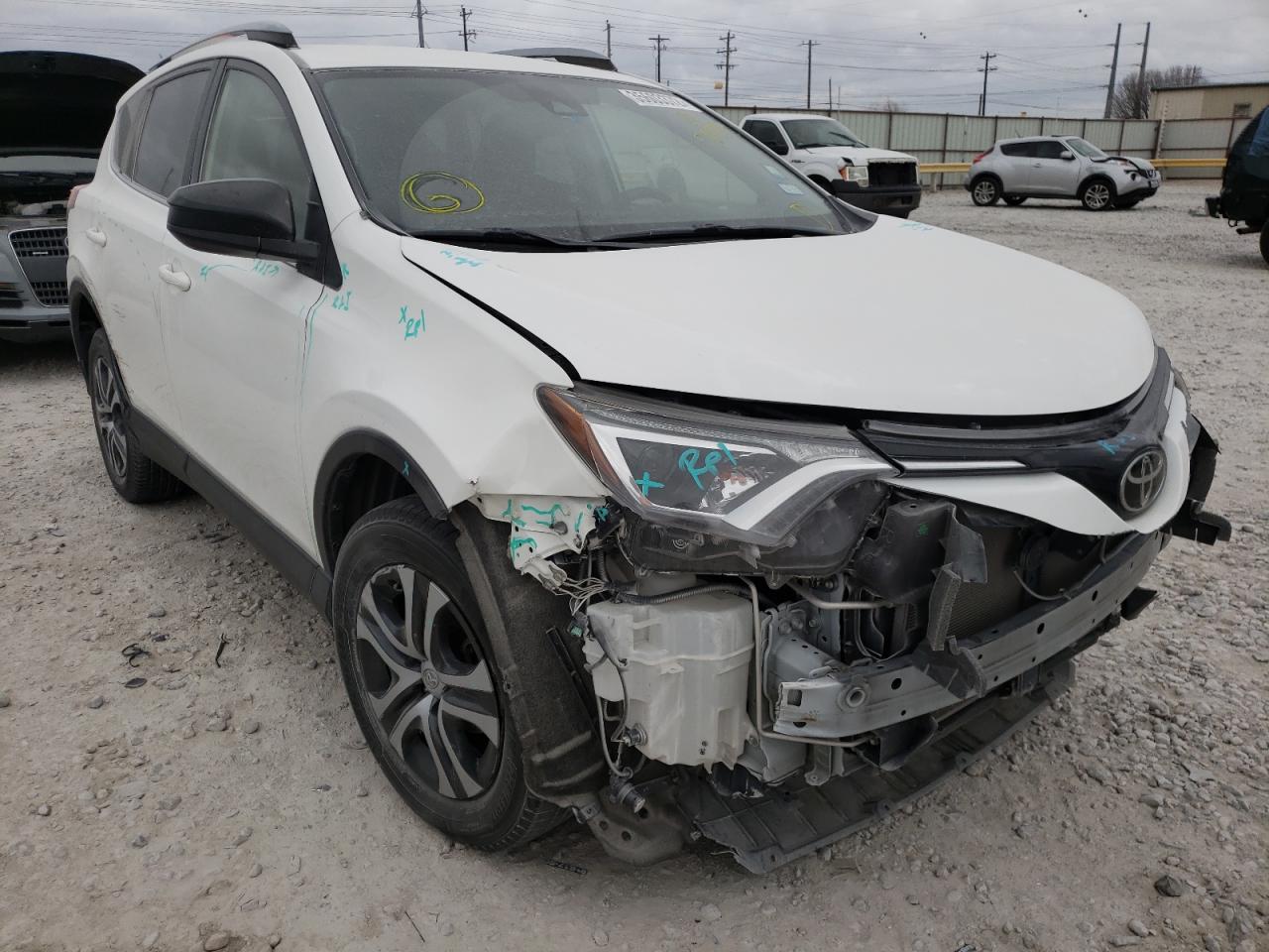 TOYOTA RAV4 LE 2017 with VIN JTMZFREV5HJ703579 - Photo from auction