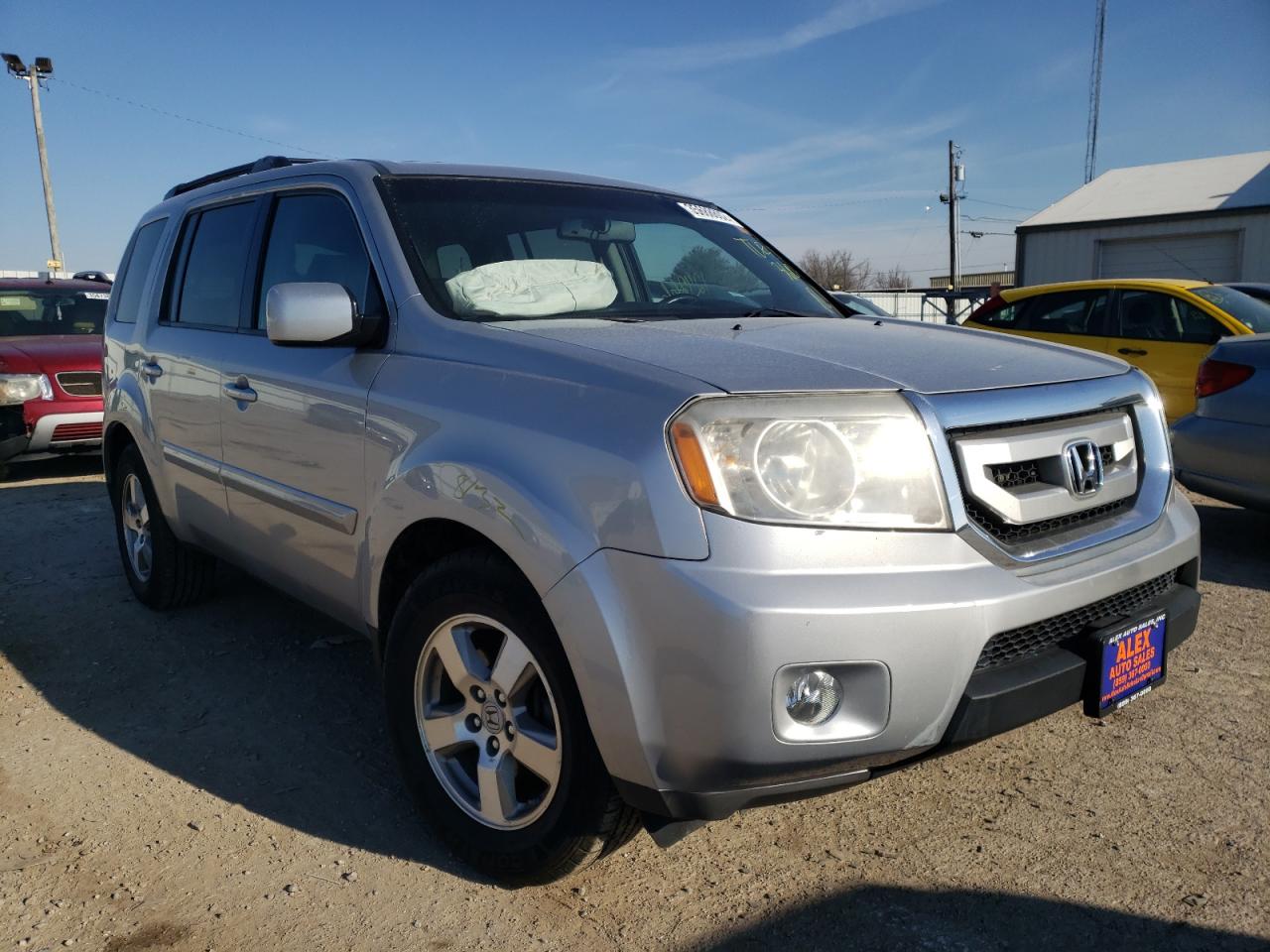 HONDA PILOT EXL 2011 with VIN 5FNYF4H51BB105174 - Photo from auction