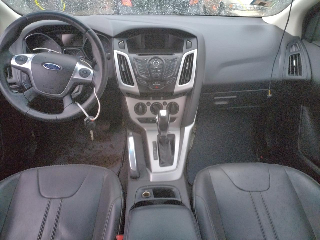 Photo 9 from auction – 2013 FORD FOCUS SE with VIN 1FADP3F21DL368835