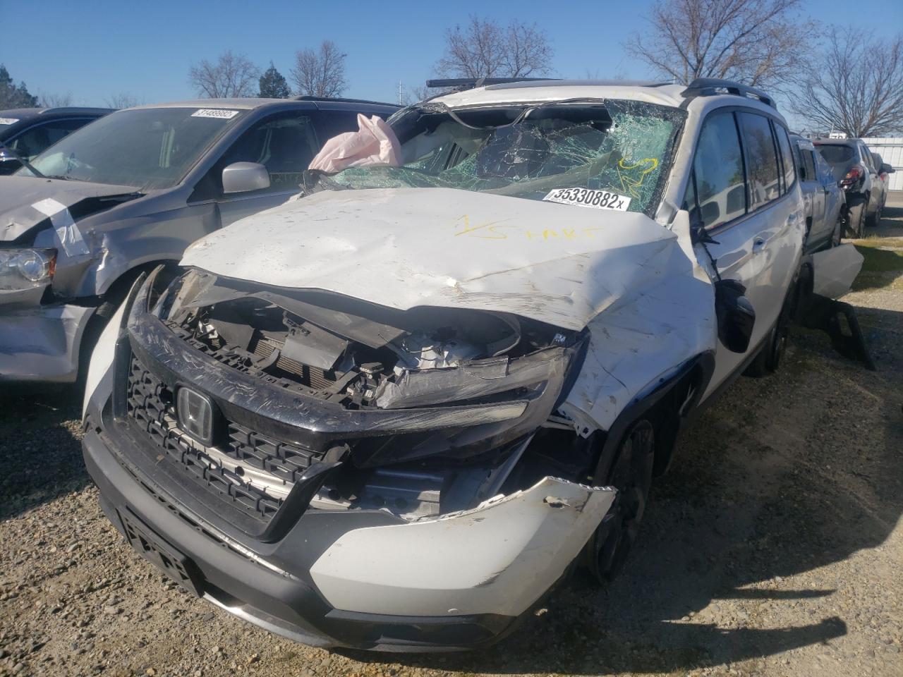 Photo 2 from auction – 2020 HONDA PASSPORT E with VIN 5FNYF8H04LB014087