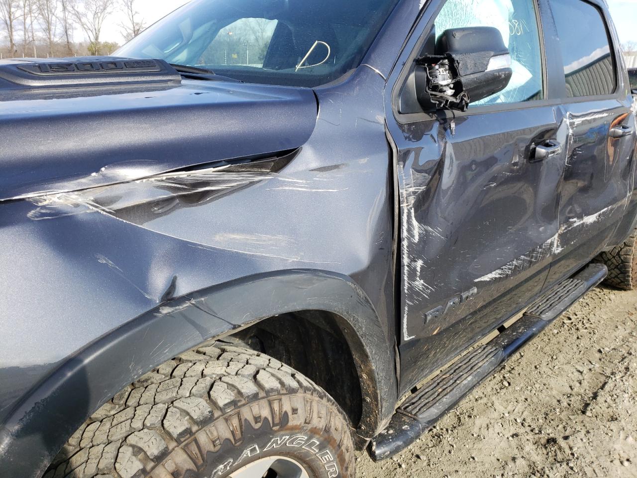Photo 9 from auction – 2021 RAM 1500 REBEL with VIN 1C6SRFLT2MN551179