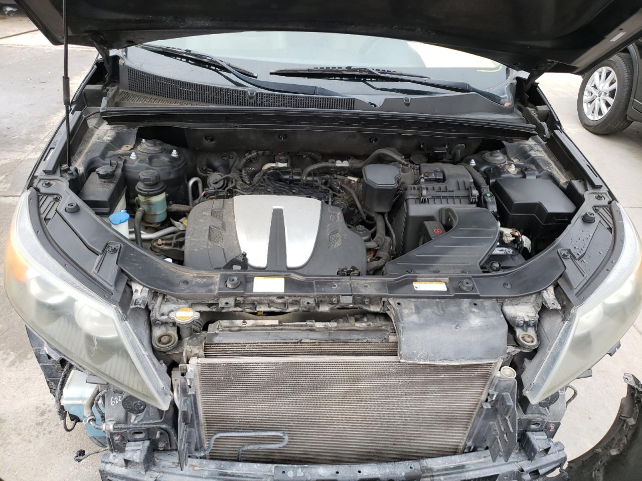 Photo 7 from auction – 2011 KIA SORENTO EX with VIN 5XYKU4A26BG077943