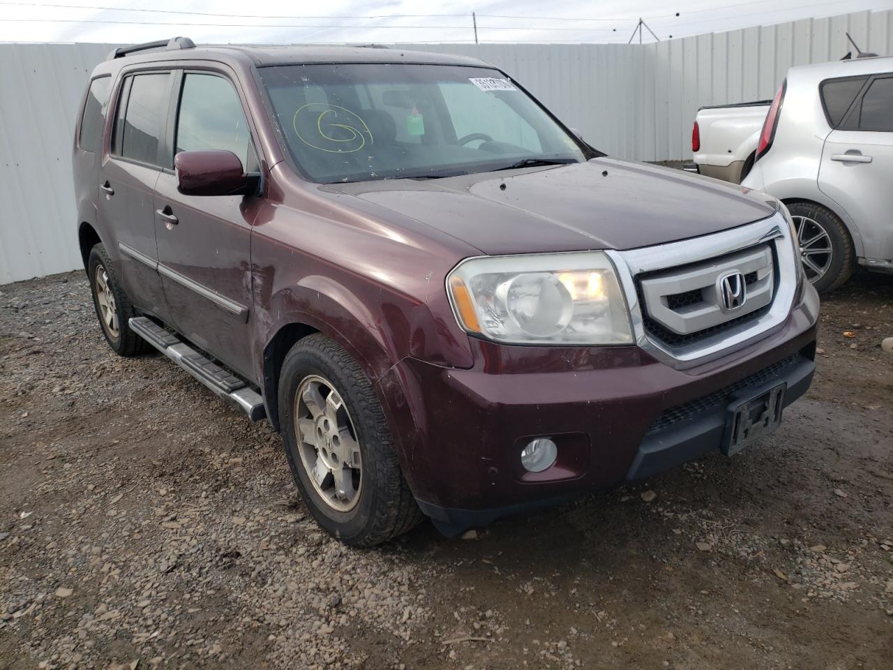 HONDA PILOT TOUR 2011 с VIN 5FNYF4H91BB022038 - Фото с аукциона