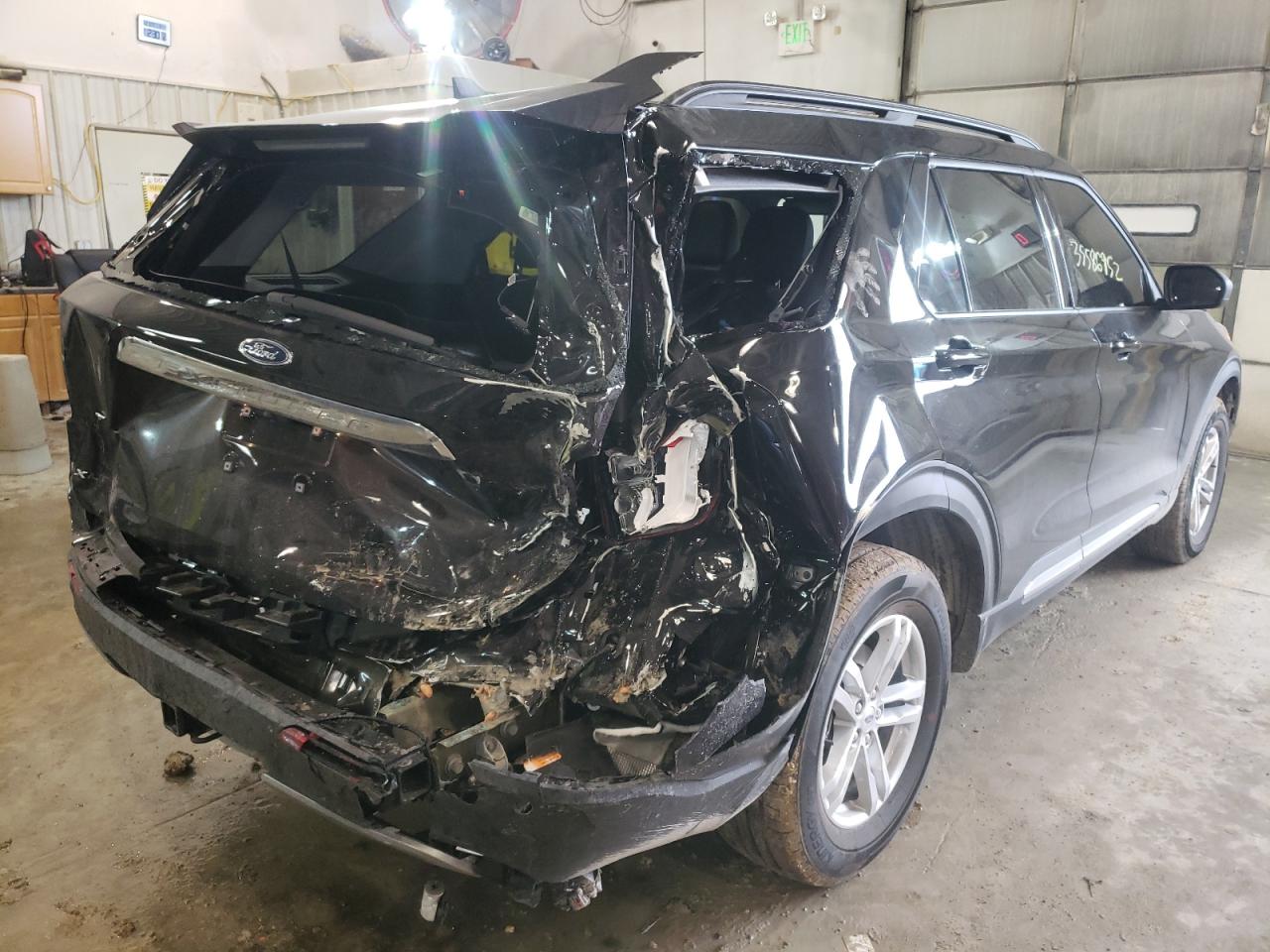 Photo 4 from auction – 2021 FORD EXPLORER X with VIN 1FMSK8DHXMGB87192
