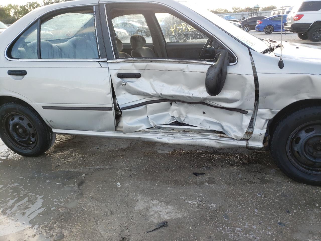Photo 9 from auction – 1998 NISSAN SENTRA E with VIN 1N4AB41DXWC762210