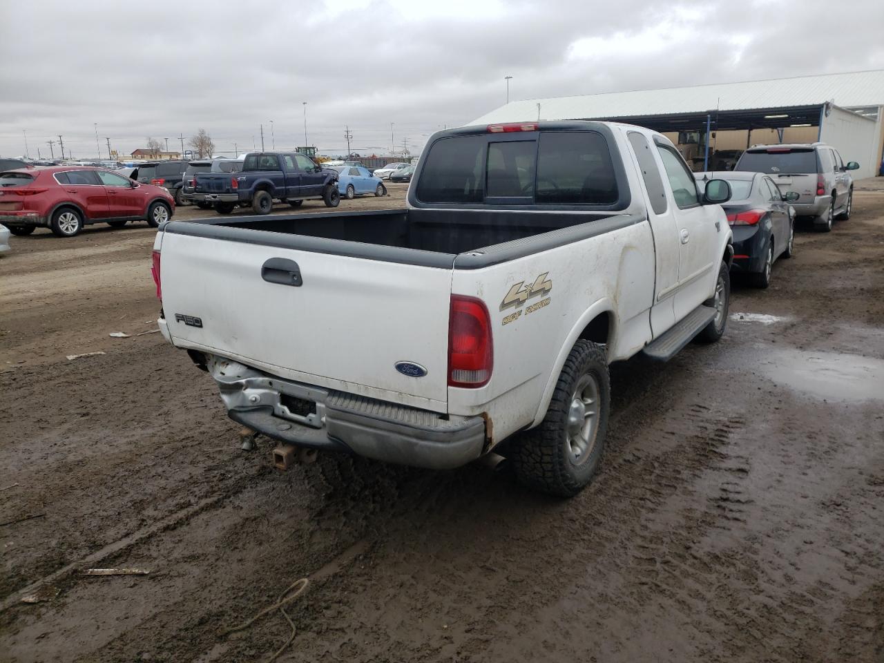 Photo 4 from auction – 1999 FORD F150 with VIN 1FTRX18L8XKC14868