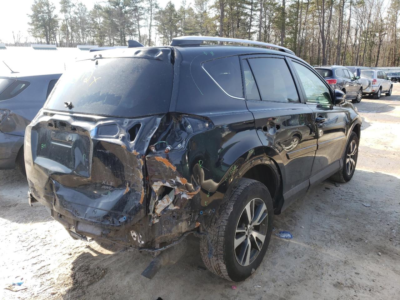 Photo 4 from auction – 2016 TOYOTA RAV4 XLE with VIN 2T3RFREV7GW496516