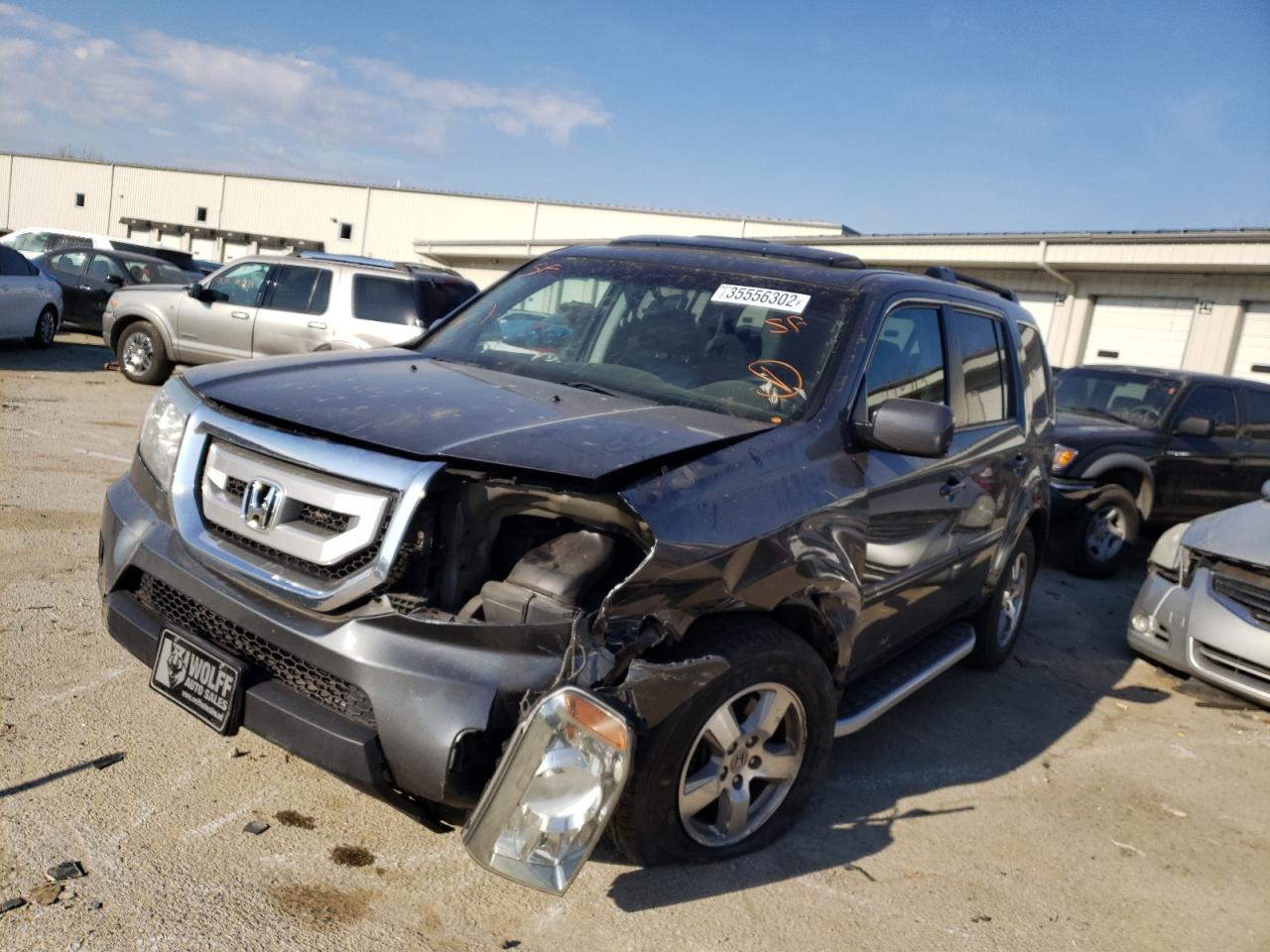 Photo 2 from auction – 2011 HONDA PILOT EXL with VIN 5FNYF3H52BB031094