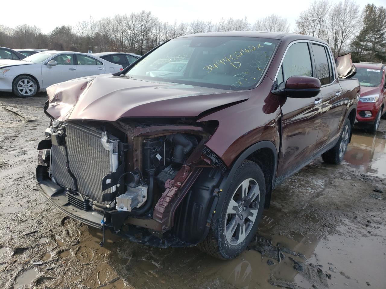 Photo 2 from auction – 2019 HONDA RIDGELINE with VIN 5FPYK3F74KB032139
