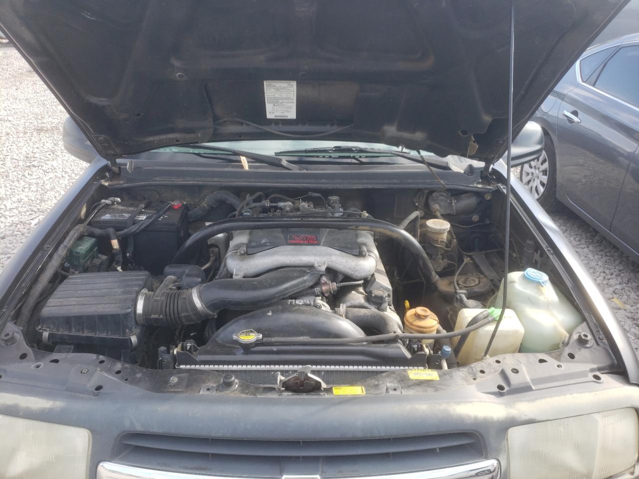 Photo 7 from auction – 2001 CHEVROLET TRACKER ZR with VIN 2CNBJ734716933377