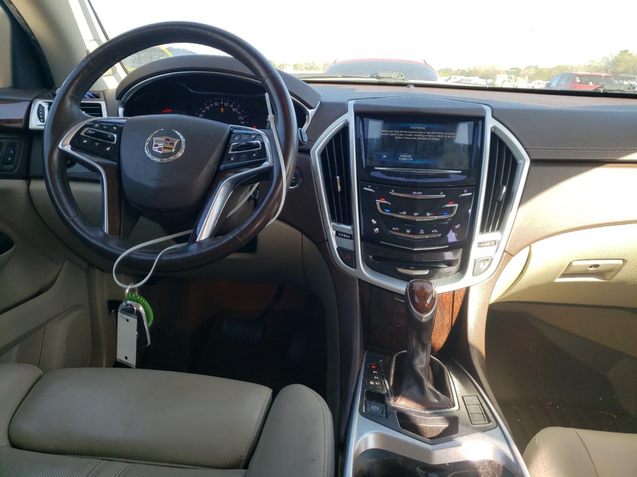 Photo 9 from auction – 2016 CADILLAC SRX PREMIU with VIN 3GYFNDE39GS576592