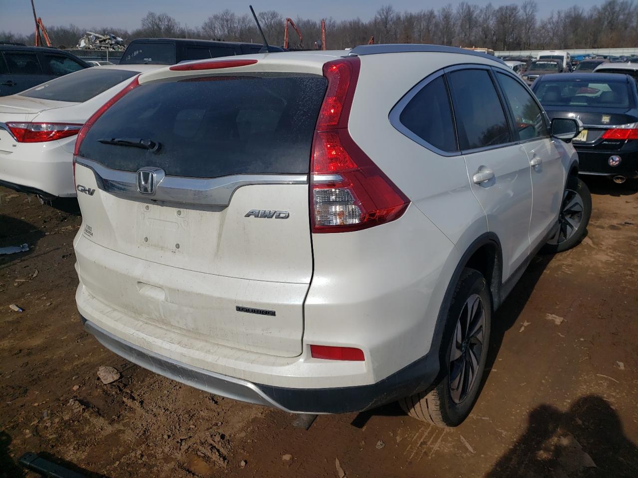 Photo 4 from auction – 2016 HONDA CR-V TOURI with VIN 5J6RM4H99GL011698