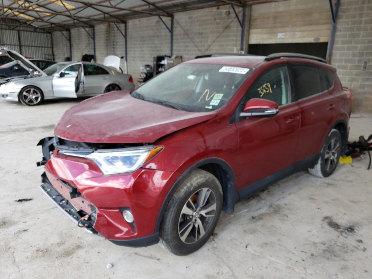 Photo 2 from auction – 2018 TOYOTA RAV4 with VIN 2T3RFREV1JW709158