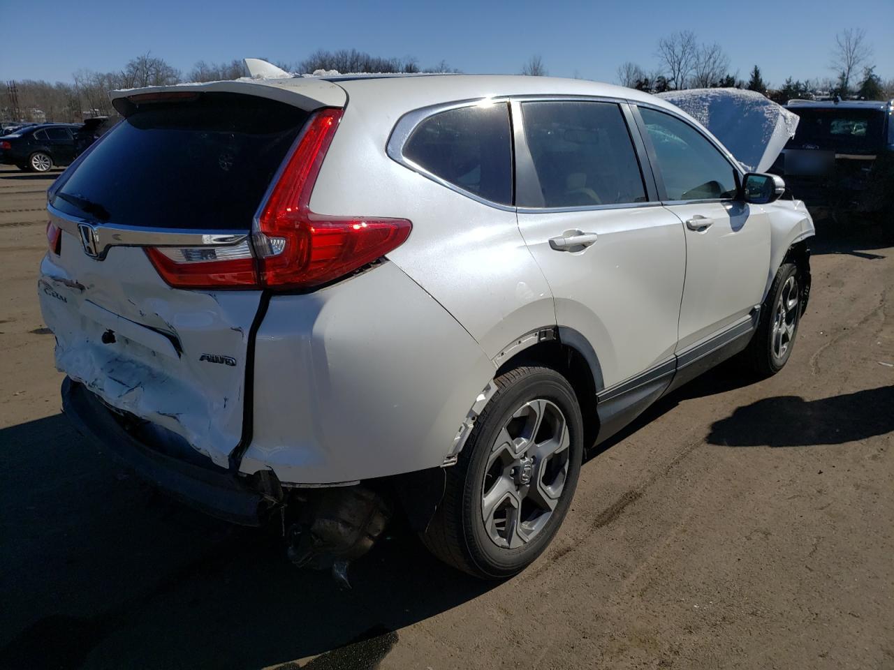 Photo 4 from auction – 2017 HONDA CR-V EXL with VIN 5J6RW2H86HL049445