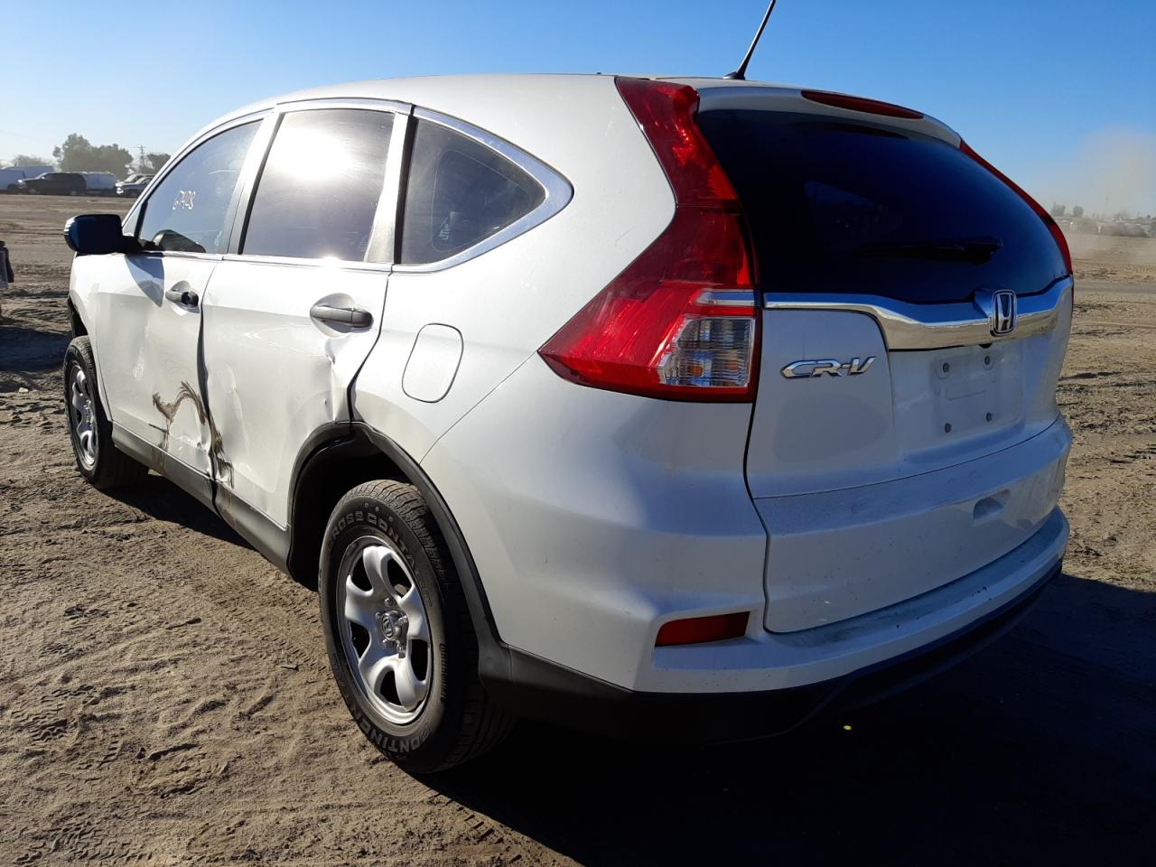 Photo 3 from auction – 2015 HONDA CR-V LX with VIN 5J6RM3H31FL027124