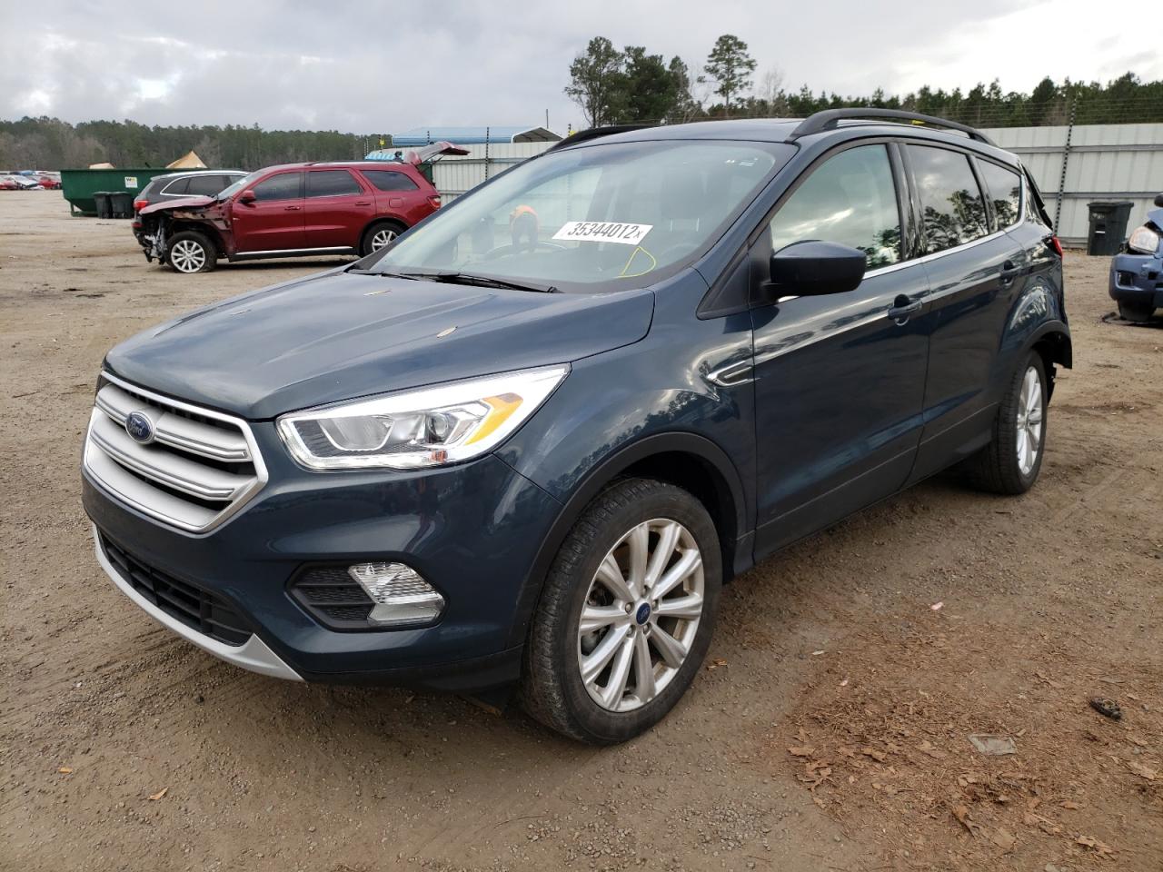 Photo 2 from auction – 2019 FORD ESCAPE SEL with VIN 1FMCU9HD3KUB25384