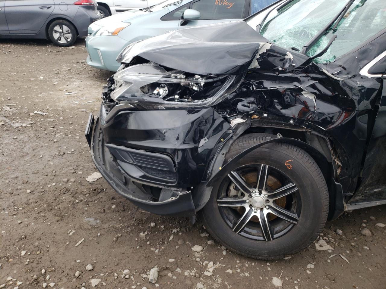 Photo 9 from auction – 2016 HONDA CR-V LX with VIN 2HKRM4H32GH613638