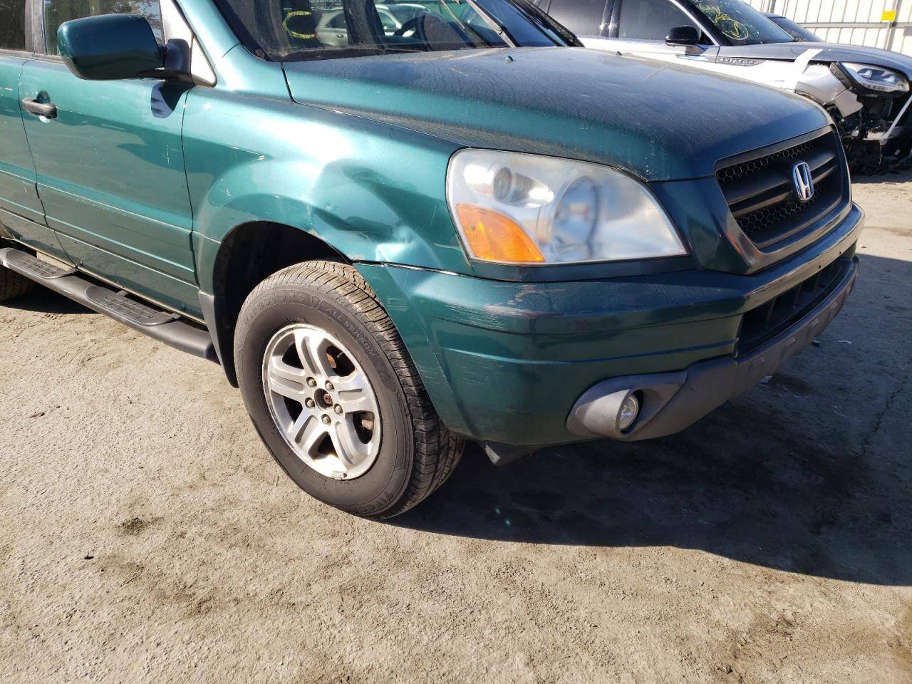 Photo 9 from auction – 2003 HONDA PILOT EX with VIN 2HKYF18443H561470