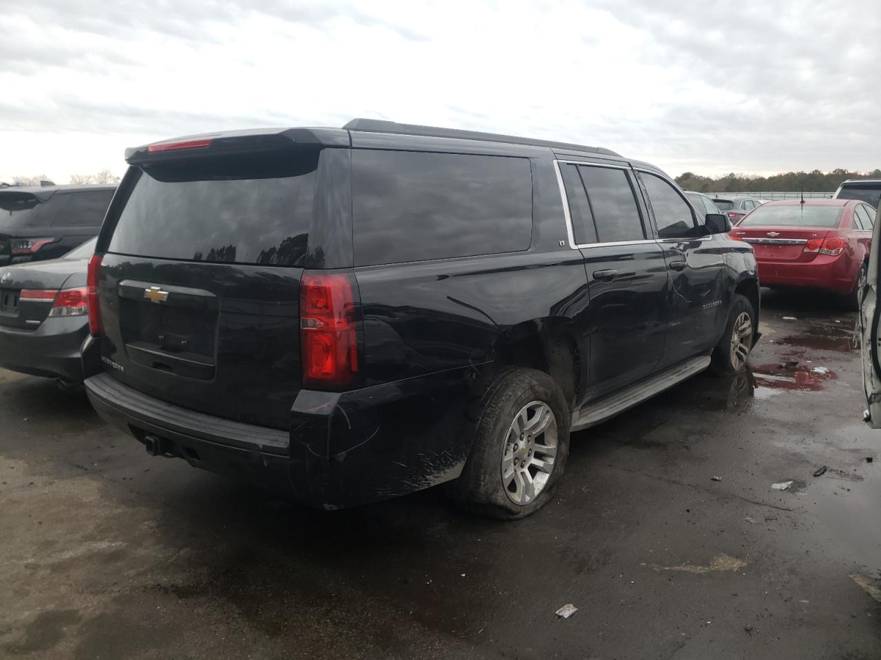Photo 4 from auction – 2015 CHEVROLET SUBURBAN K with VIN 1GNSKJKC8FR554592
