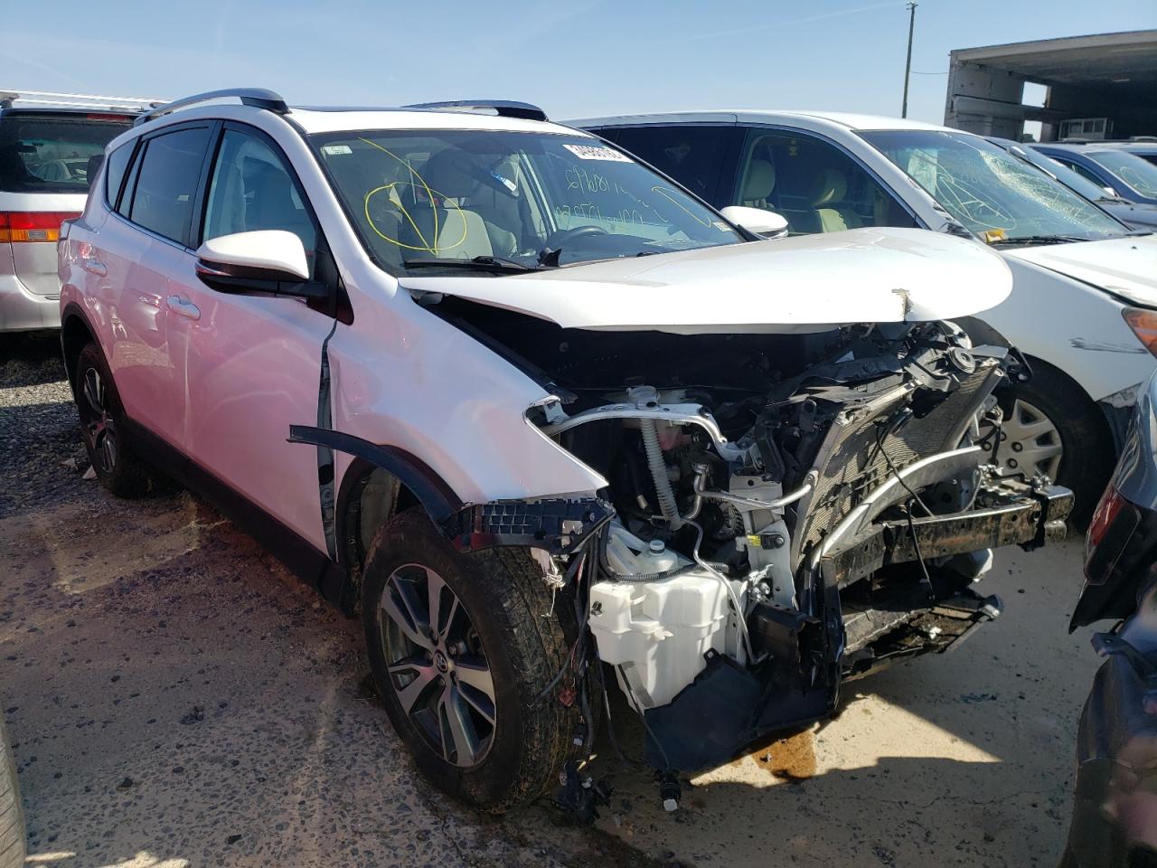 TOYOTA RAV4 XLE 2016 with VIN 2T3WFREV0GW253553 - Photo from auction