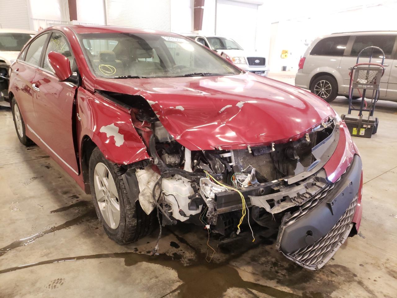 HYUNDAI SONATA HYB 2012 with VIN KMHEC4A41CA035243 - Photo from auction