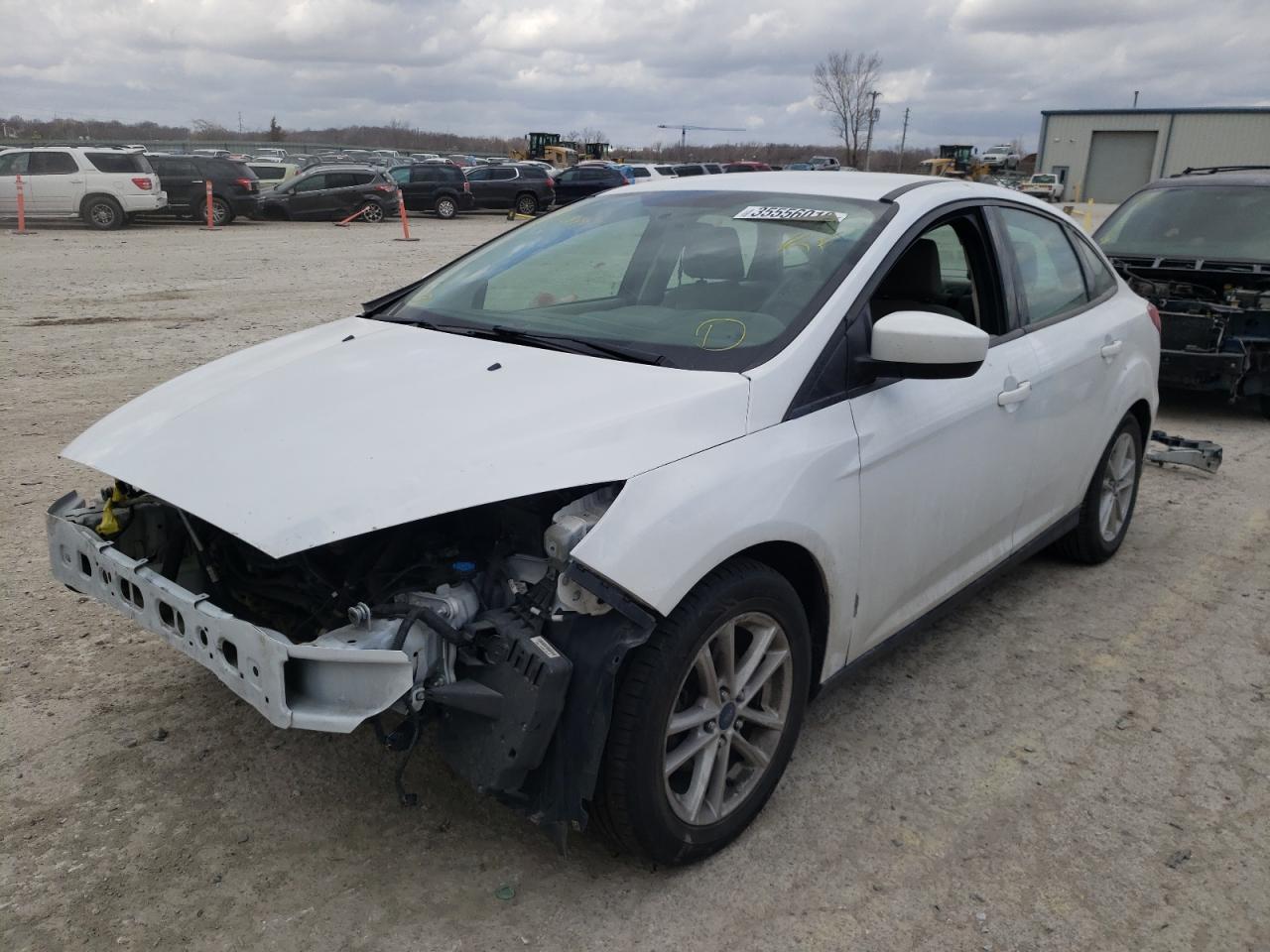 Photo 2 from auction – 2018 FORD FOCUS SE with VIN 1FADP3F27JL231944