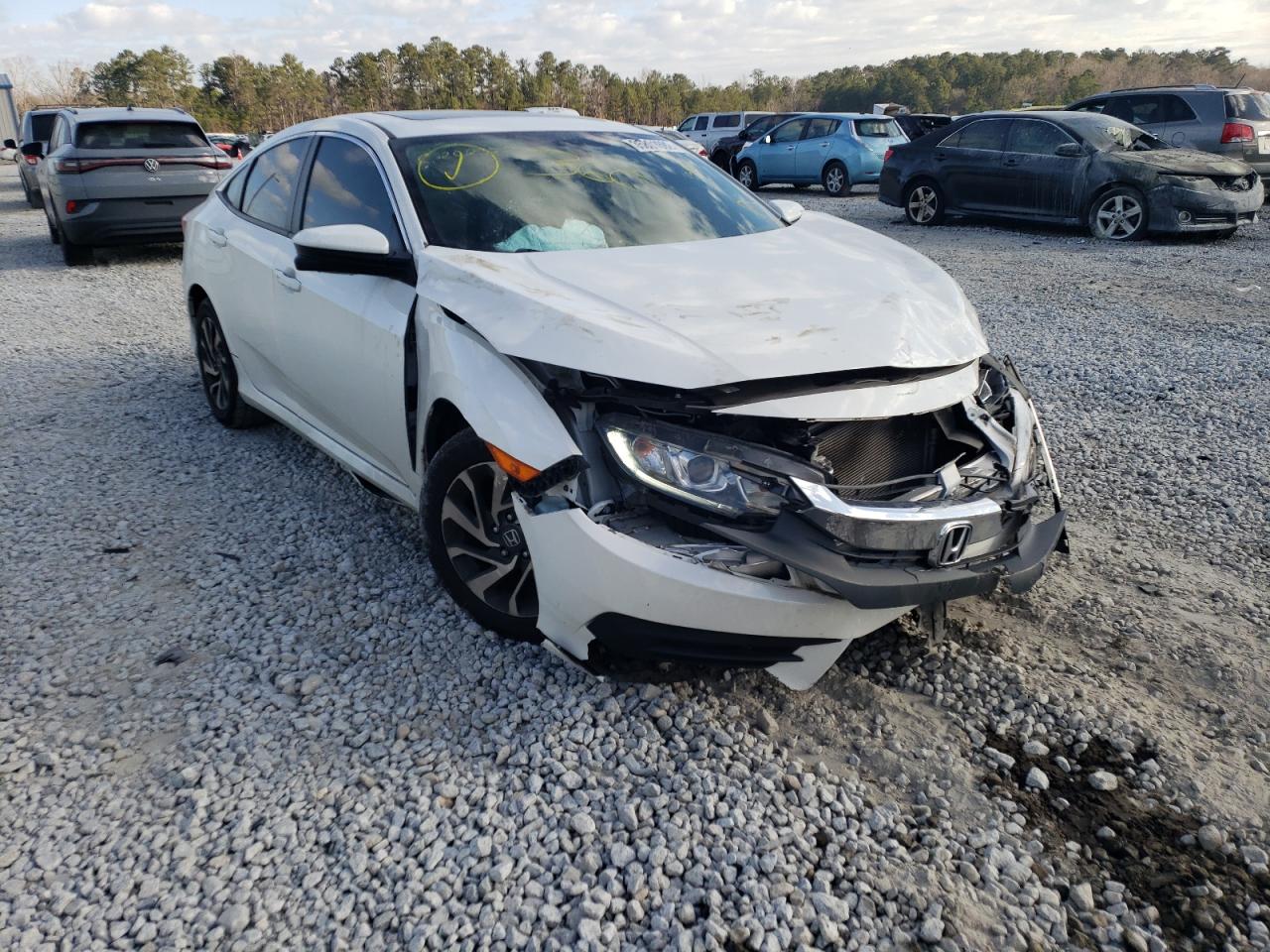 HONDA CIVIC EX 2017 with VIN 19XFC2F75HE003173 - Photo from auction