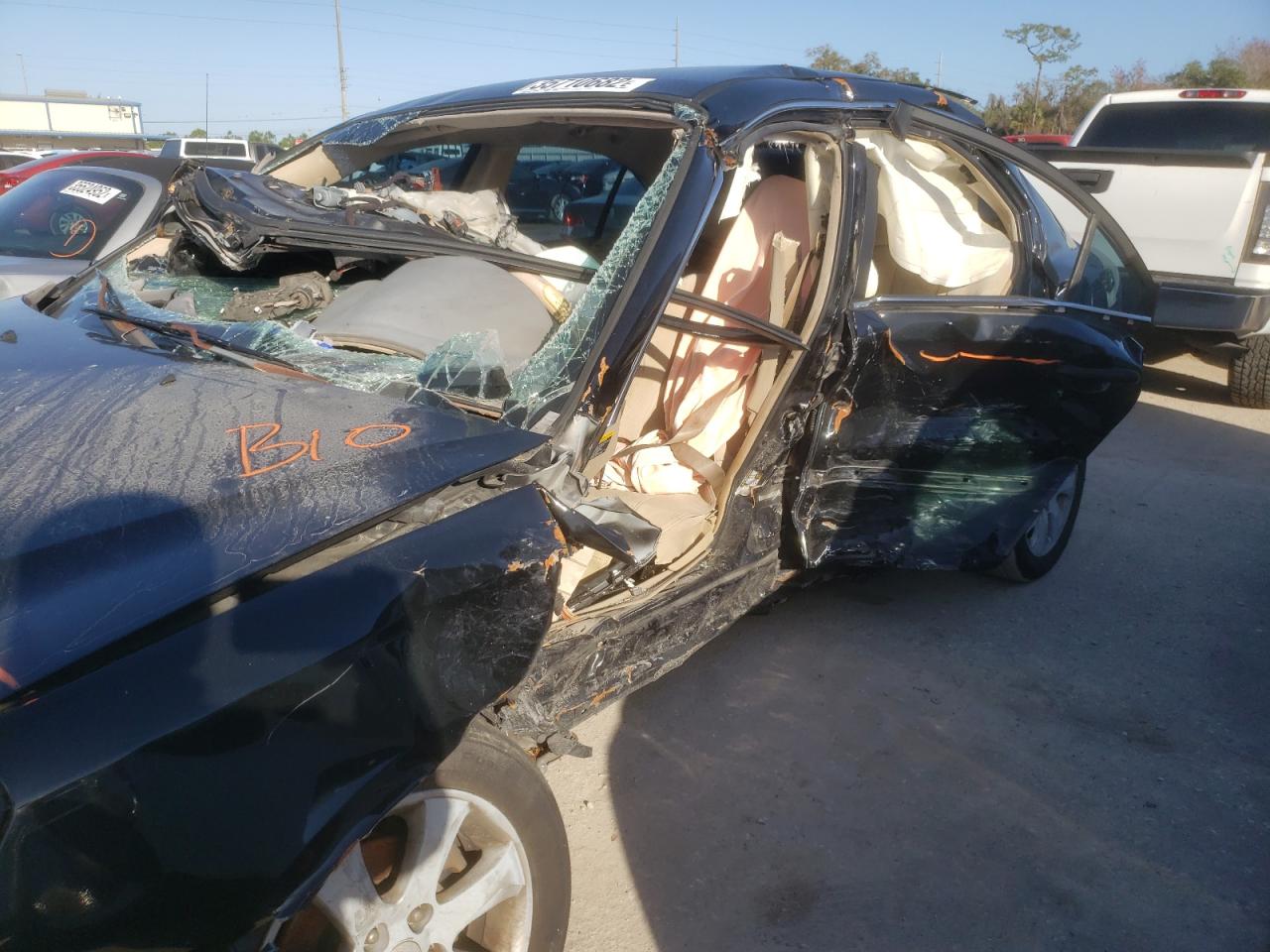 Photo 9 from auction – 2006 KIA OPTIMA LX with VIN KNAGE124965024246