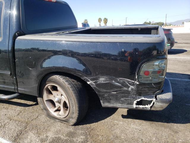 Photo 9 from auction – 2003 FORD F150 with VIN 1FTRW07673KB29216
